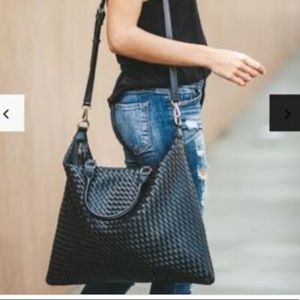 NEW w/out tags. Black woven tote bag